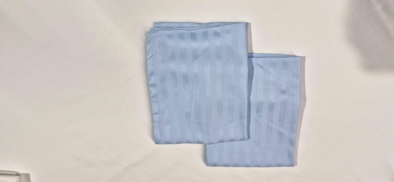 Ambition Home easy-care pillowcase highlights washable, low-maintenance fabric.