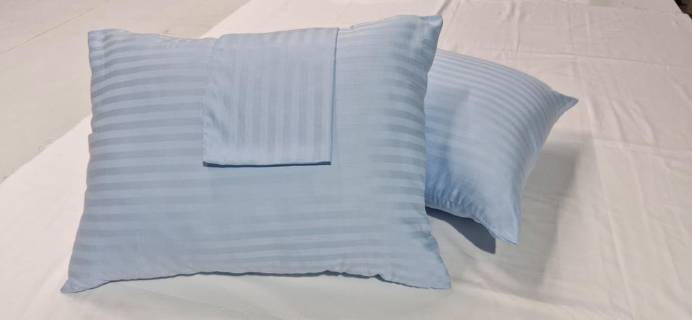 Ambition Home zipper-closure light blue closeup highlights secure fit and smooth finish.