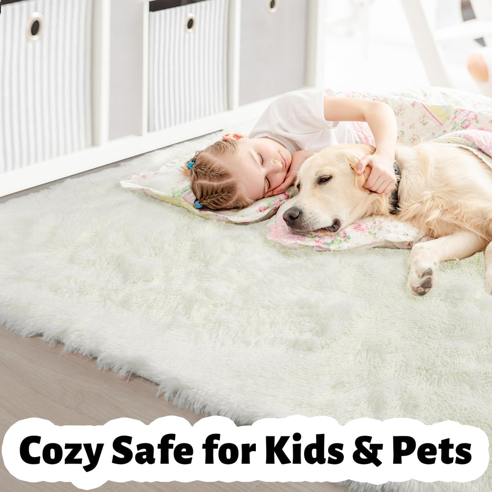 Amdrebio ivory white rug features thick pile for warm lounging and cuddling.