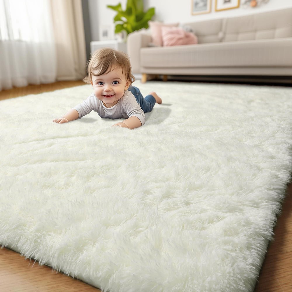 Amdrebio ivory white rug suits kids' play areas with fluffy inviting look.