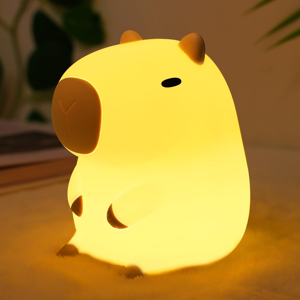 Ammonite Capybara Night Light front view showing soft glow and safe silicone finish for kids