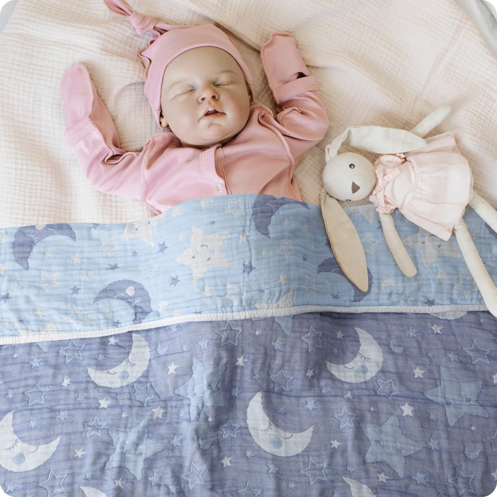Amrcbb Cotton Muslin Blanket beach scene hints at lightweight coverage on sunny days