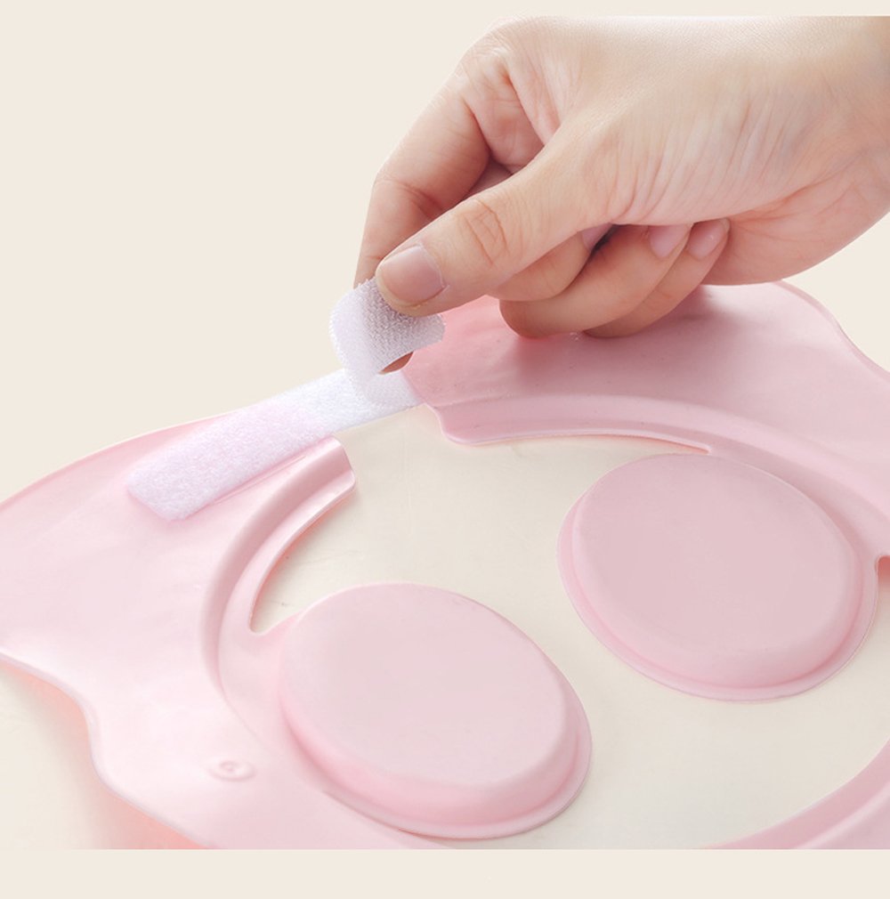 AMTOOCH pink cap shown in bath-time use with adjustable sizing.
