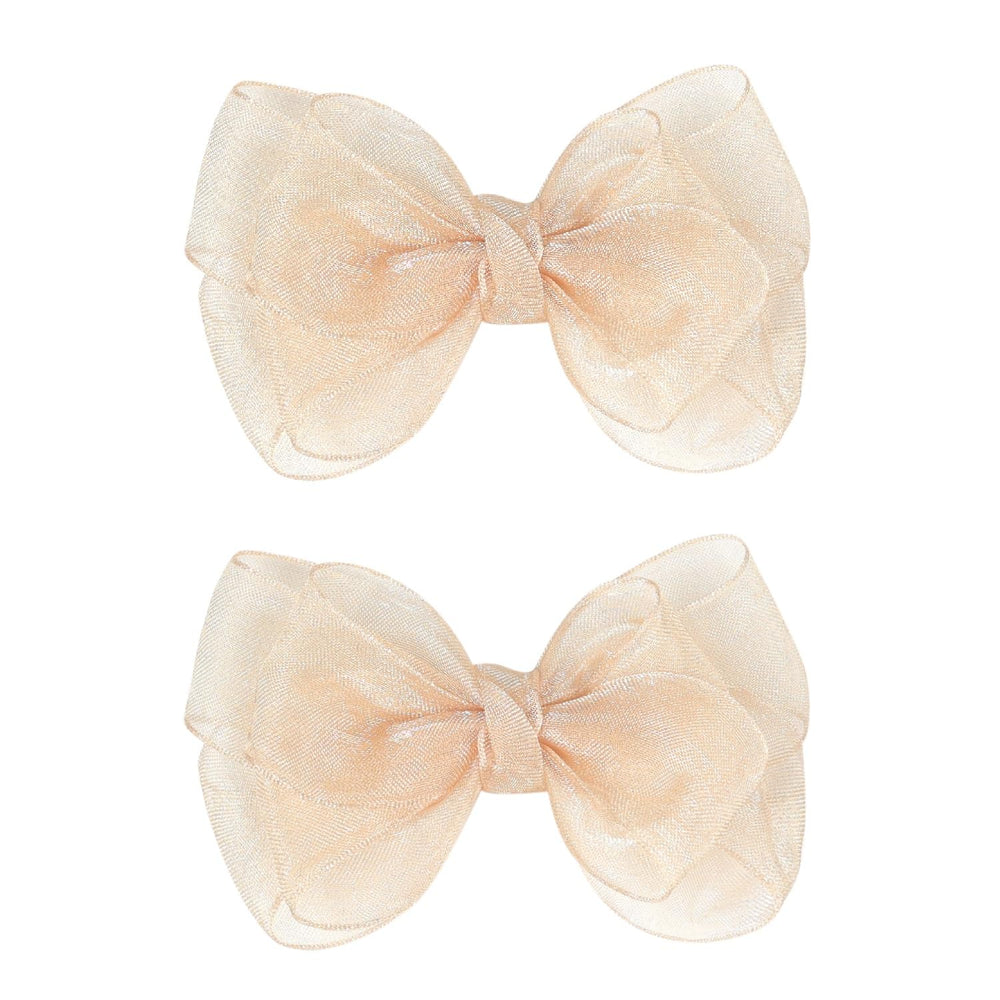 Amybasic 3.5-inch organza bows in champagne gold on hair, lightweight and elegant for daily wear.
