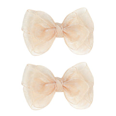 Amybasic 3.5-inch organza bows in champagne gold on hair, lightweight and elegant for daily wear.