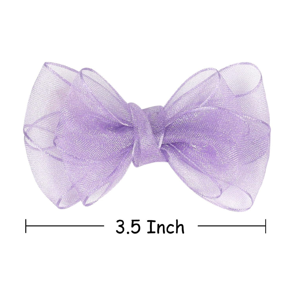 Amybasic organza bow on toddler in purple complements outfits with subtle shimmer.