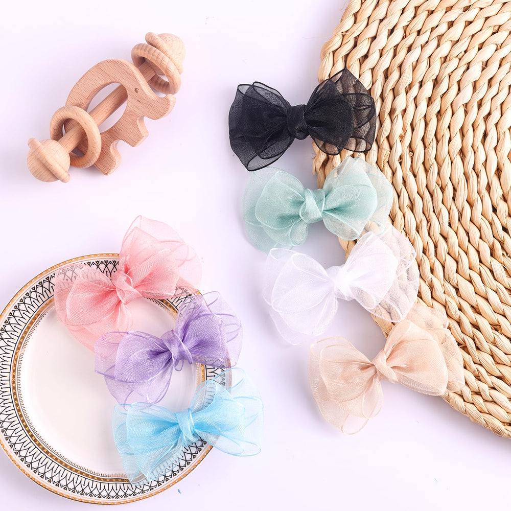 Amybasic girl wearing black organza bow shows easy outfit pairing