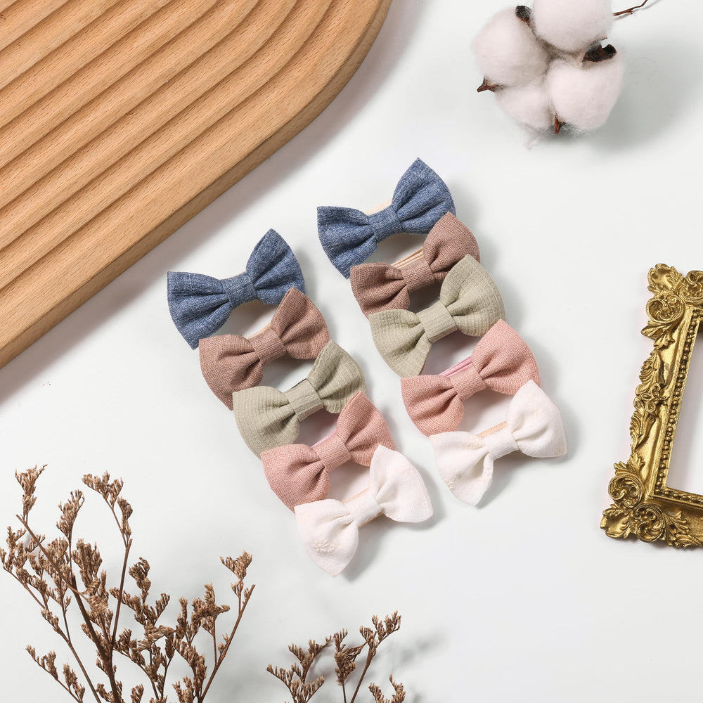 Amybasic mini 2-inch bow clip fits newborns to preschoolers for light, comfortable styling.