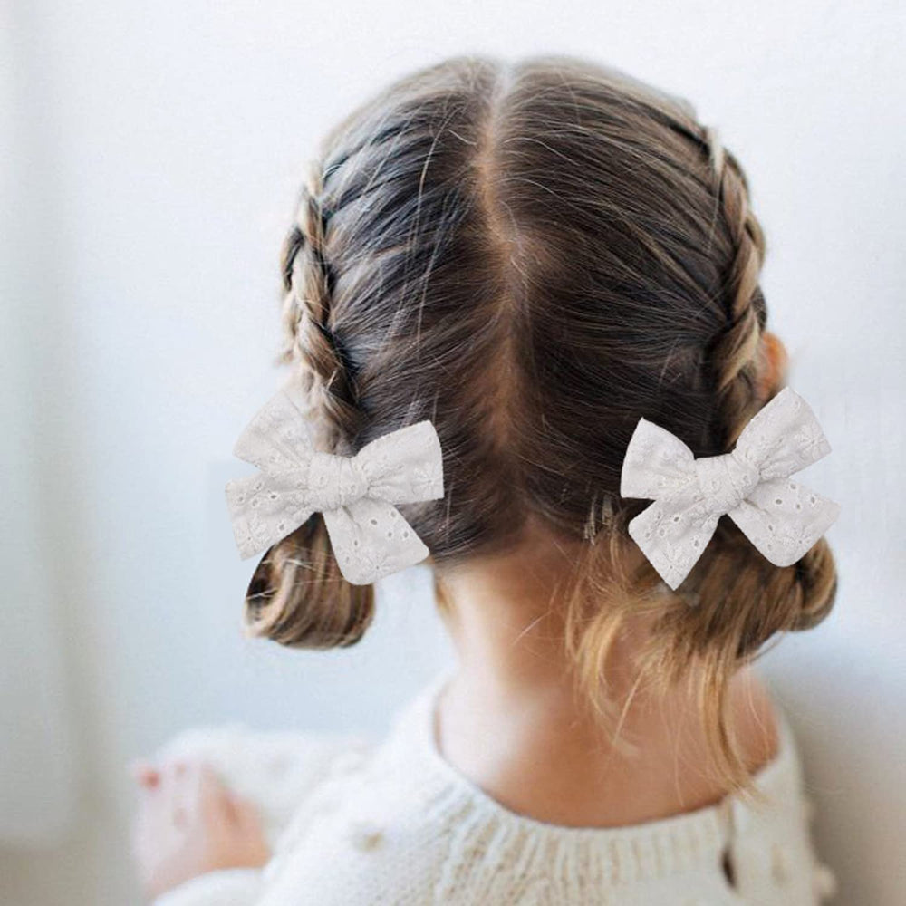 AMYDECOR 3.2-inch girls white linen hair bow closeup shows durable stitching
