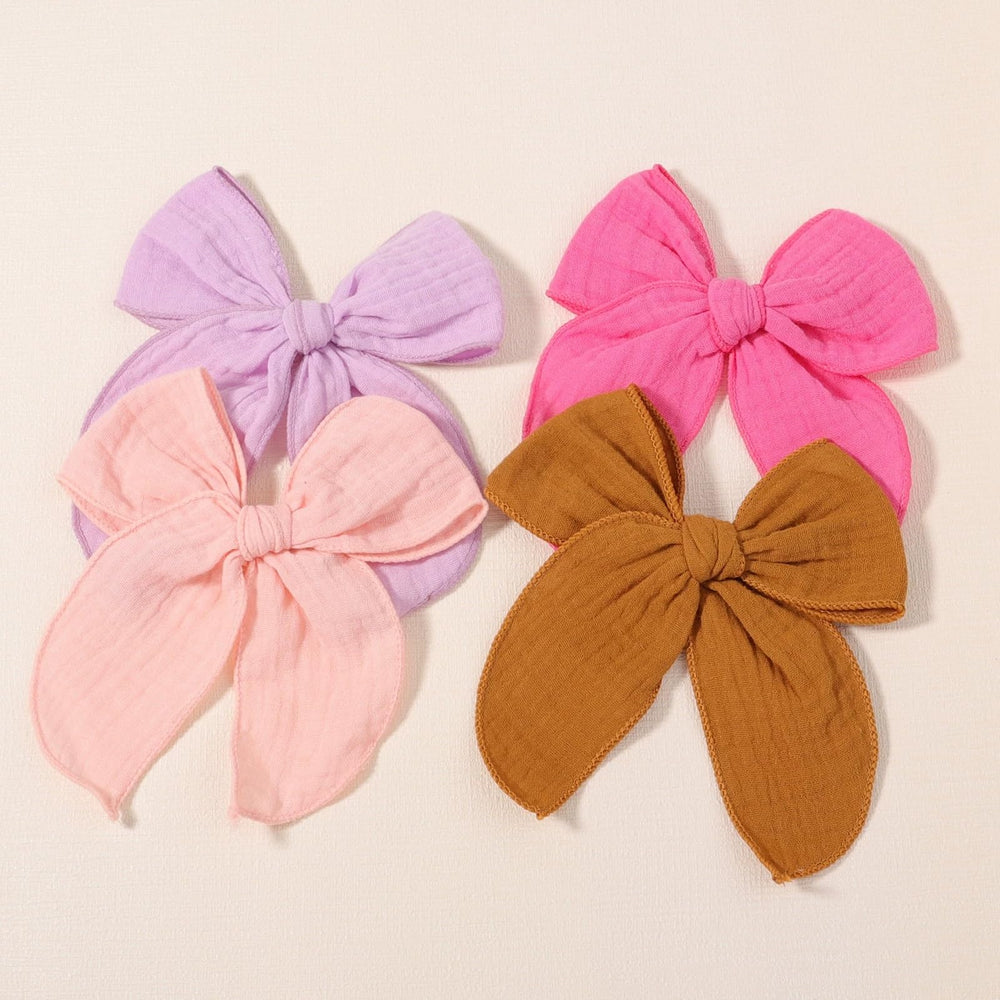 AMYDECOR bow in hair-model shows versatile styling for ponytails.