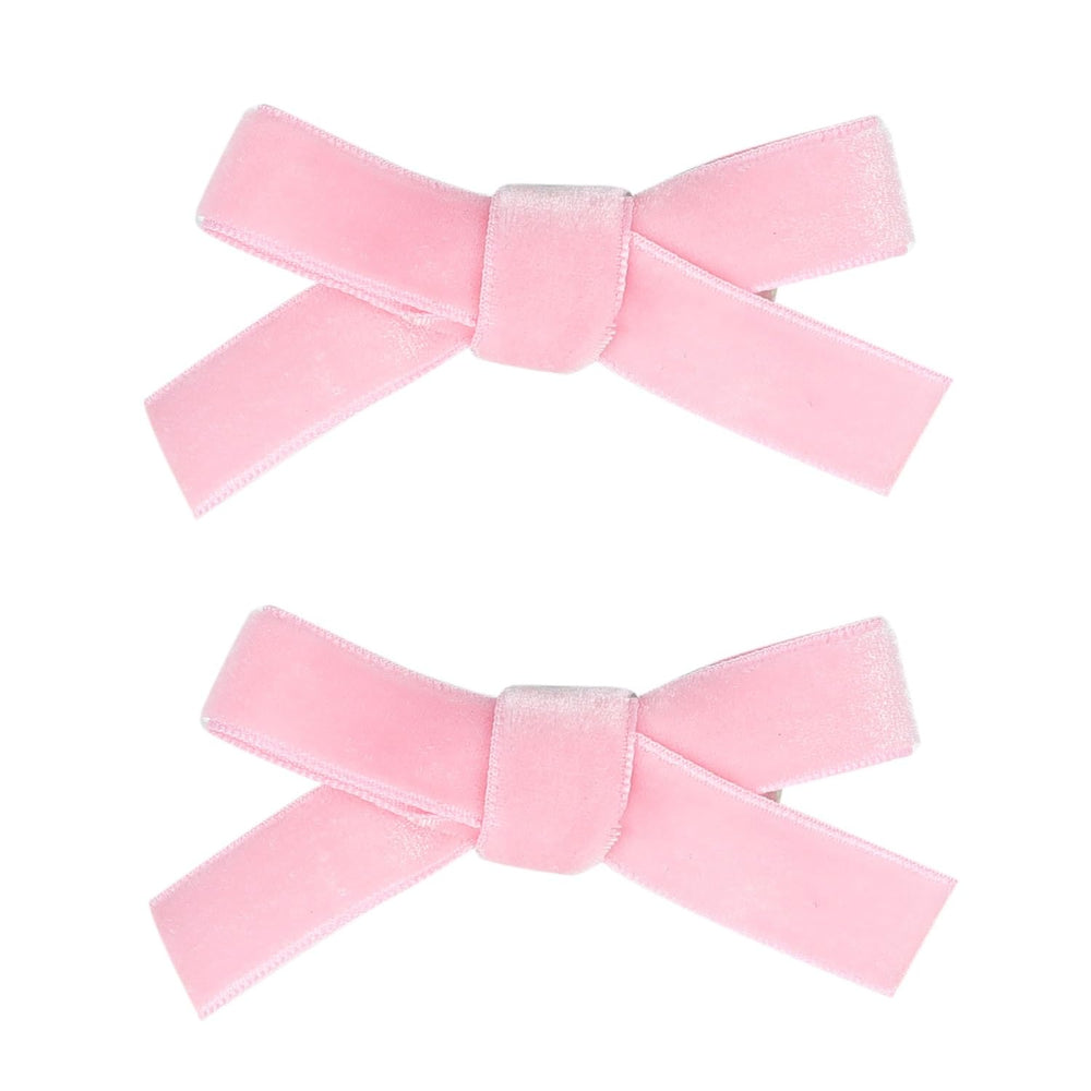 AMYDECOR velvet bow clips in pink for secure baby hairstyles.