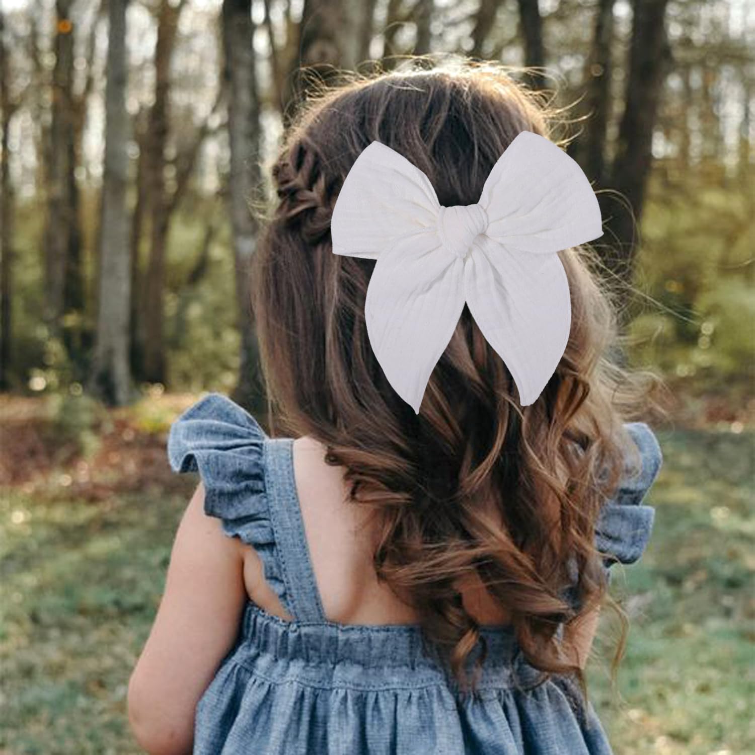 AMYDECOR Fable bow white clip showcases sturdy alligator clip for secure daily wear