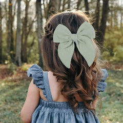 AMYDECOR linen-cotton bow texture offers gentle comfort for baby hair daily styling.