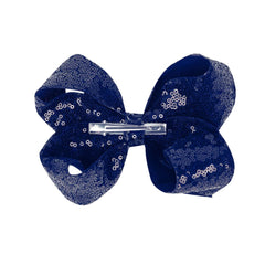 AMYDECOR navy blue sequin bow worn with outfits for festive styling