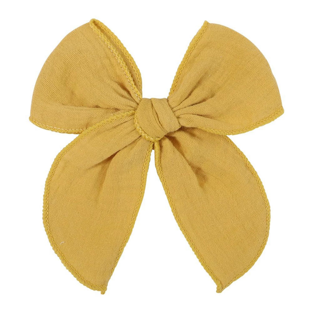 AMYDECOR Yellow Fable Bow close-up shows soft linen-cotton fabric for cozy everyday wear.