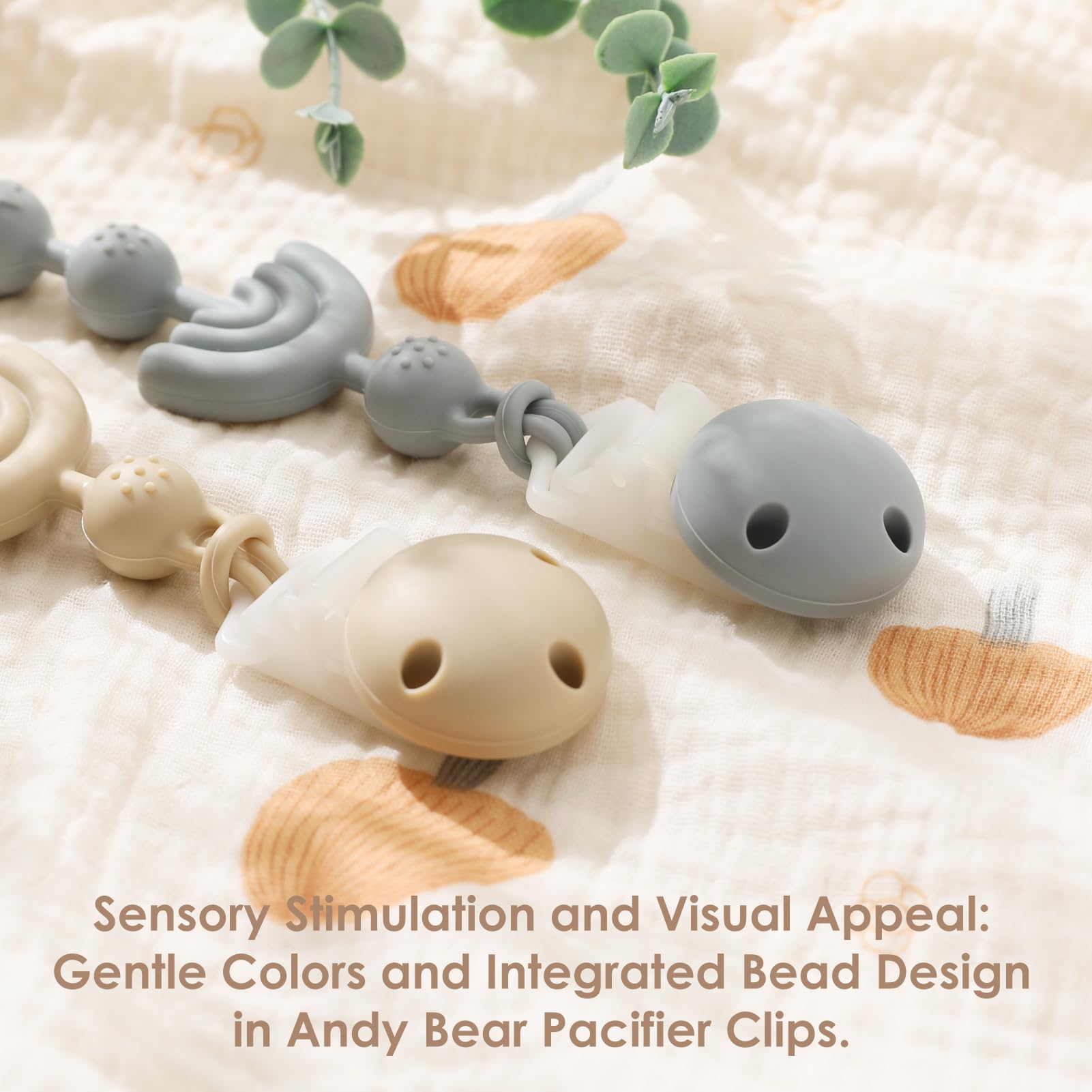 Andy Bear sage silicone pacifier clip closeup highlights gentle color and baby friendly materials