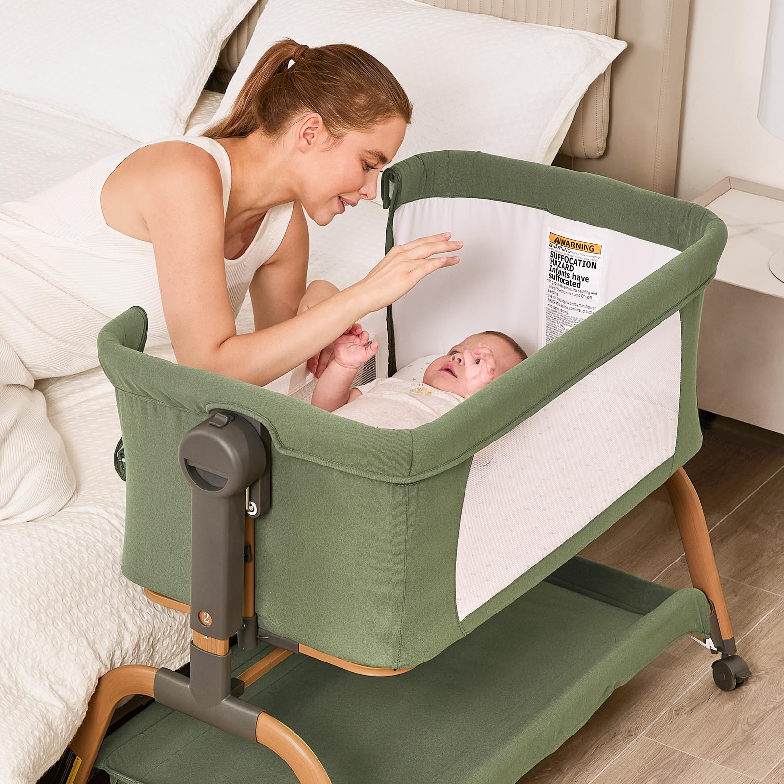 ANGELBLISS bassinet green mesh sides promote breathability and safe, comfortable sleep.