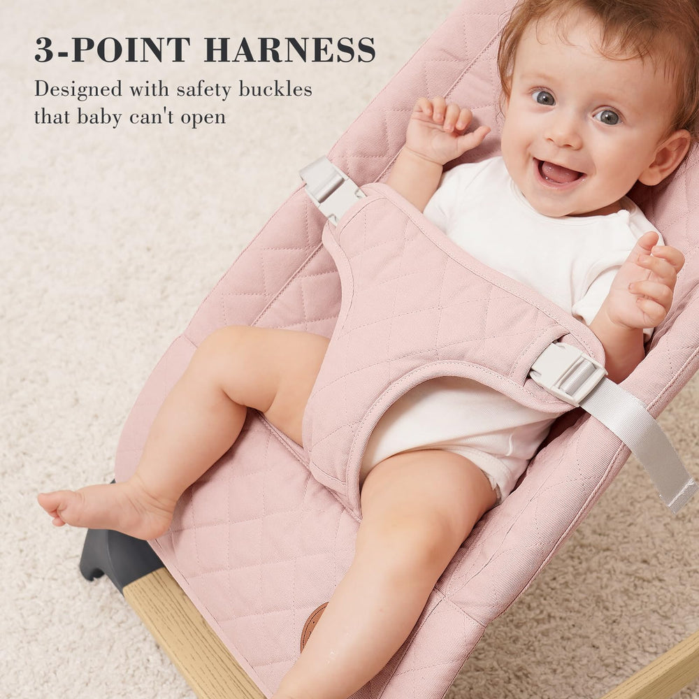 ANGELBLISS Baby Bouncer pink wood-base detail highlights eco-friendly, sturdy support