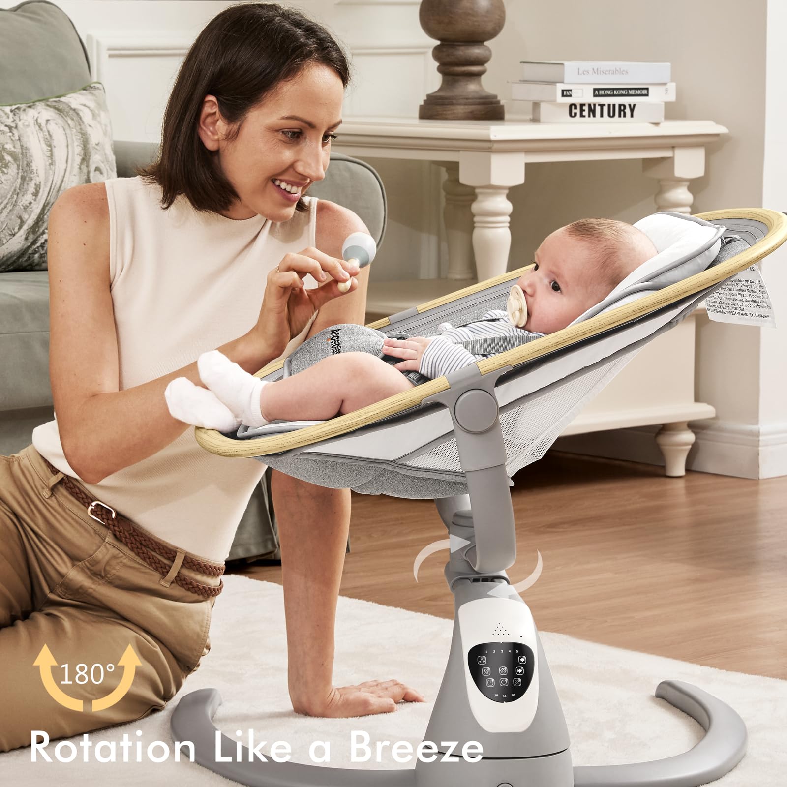 Angelbliss baby swing demonstrates 180° rotation for versatile soothing.