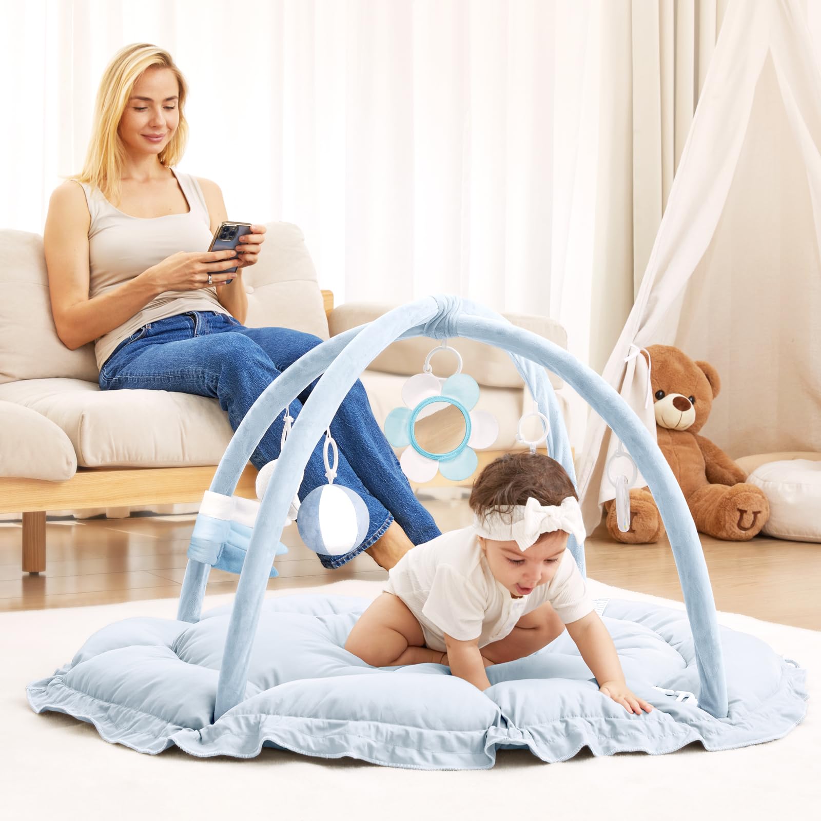 ANGELBLISS baby gym in-use image highlights stage-based development through multi-mode play.