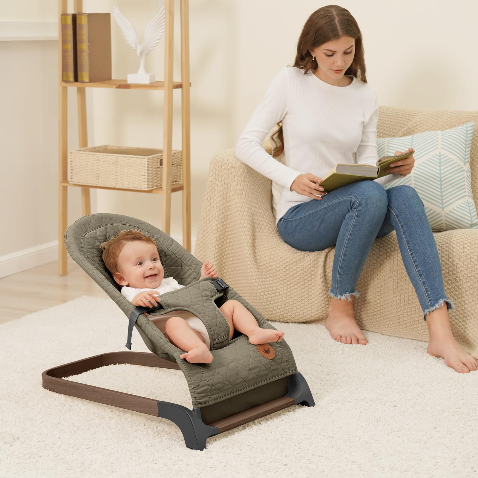 ANGELBLISS baby bouncer portable design moves easily between rooms.
