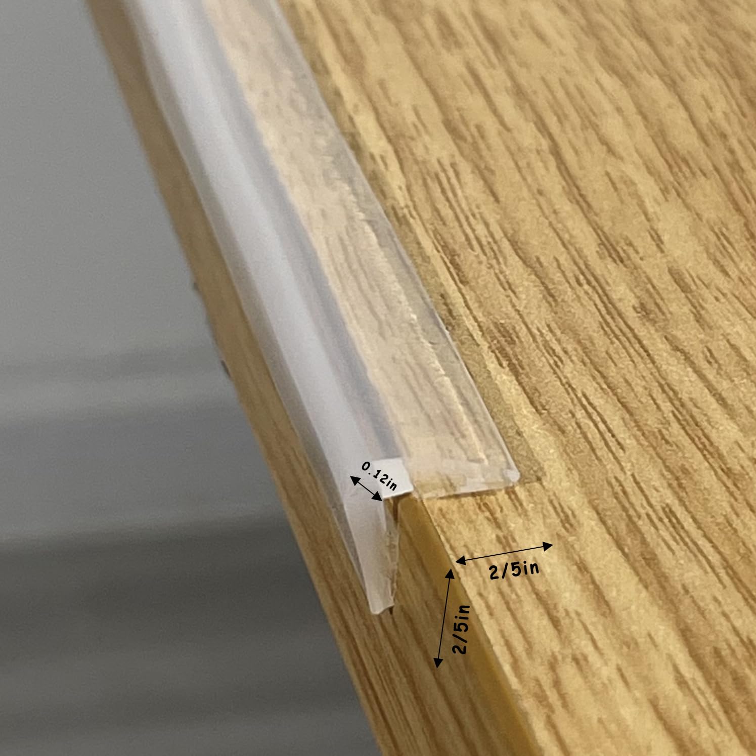 Angloria Edge Protector installed on wooden corner demonstrates discreet protection.