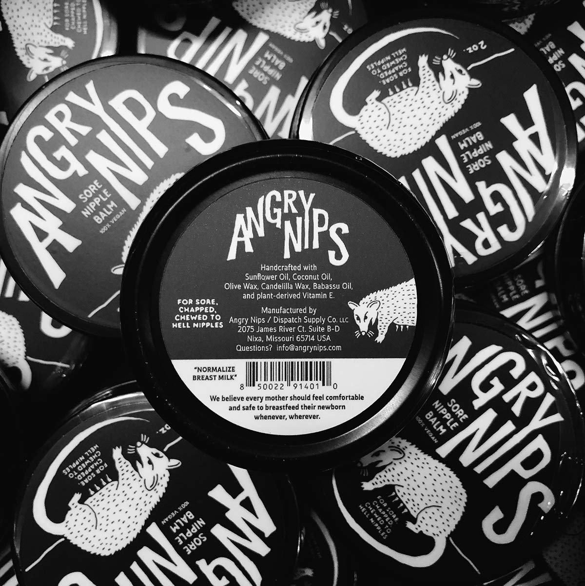 Angry Nips balm being applied to irritated skin for relief.