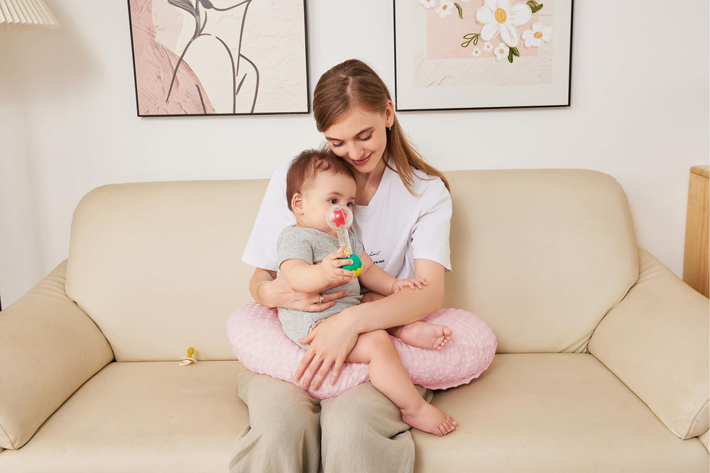 ANHEBEIBEI nursing pillow in use demonstrates ergonomic height for comfortable feeding.