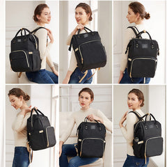 ANWTOTU diaper bag interior with multiple pockets for organized essentials.
