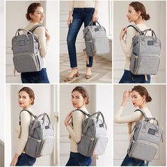 ANWTOTU diaper bag with USB charging port for quick mobile charging.