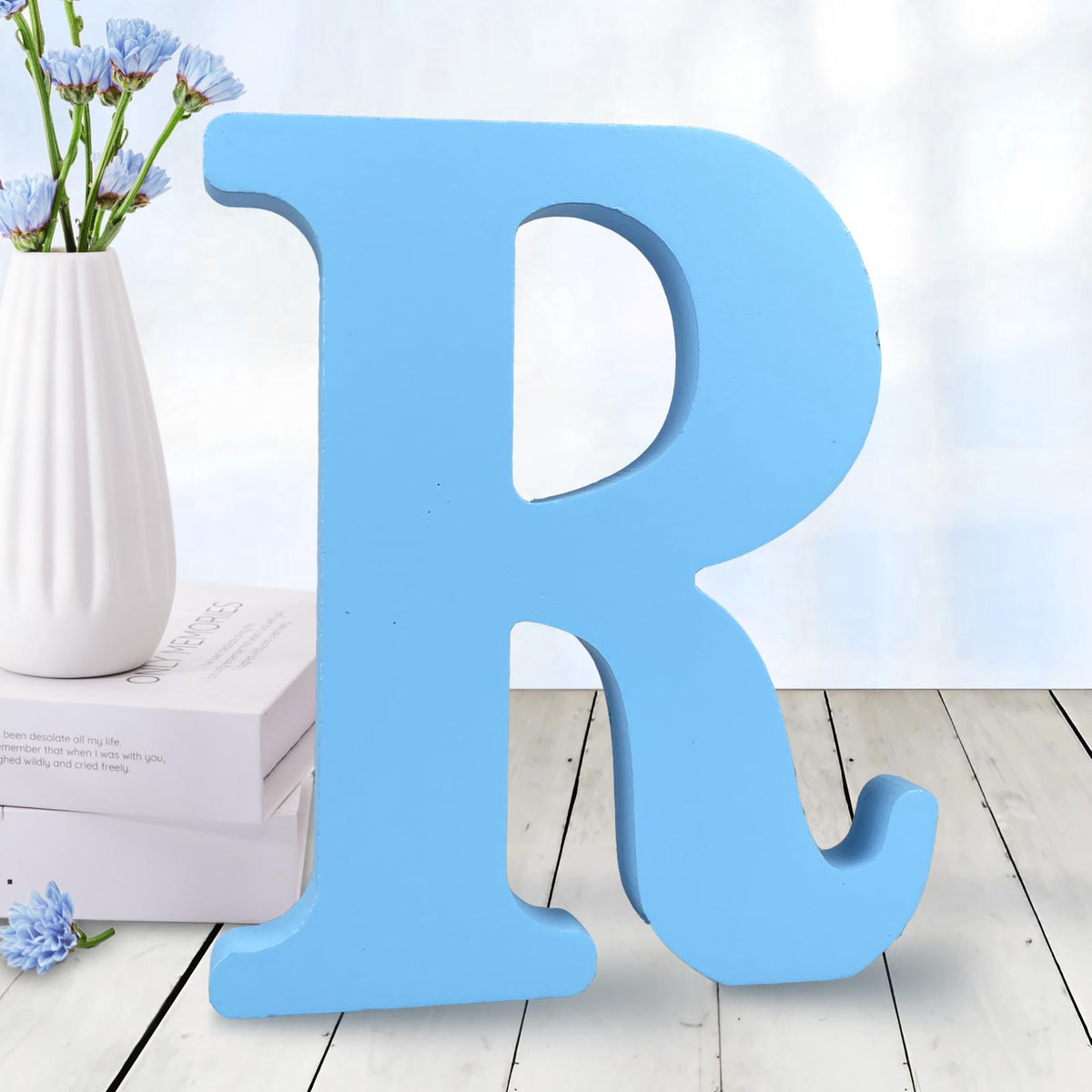 AOCEAN 6-inch blue wood letters for wall decor and DIY projects.