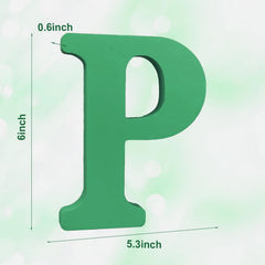 AOCEAN green wood letter on wall adds rustic charm.