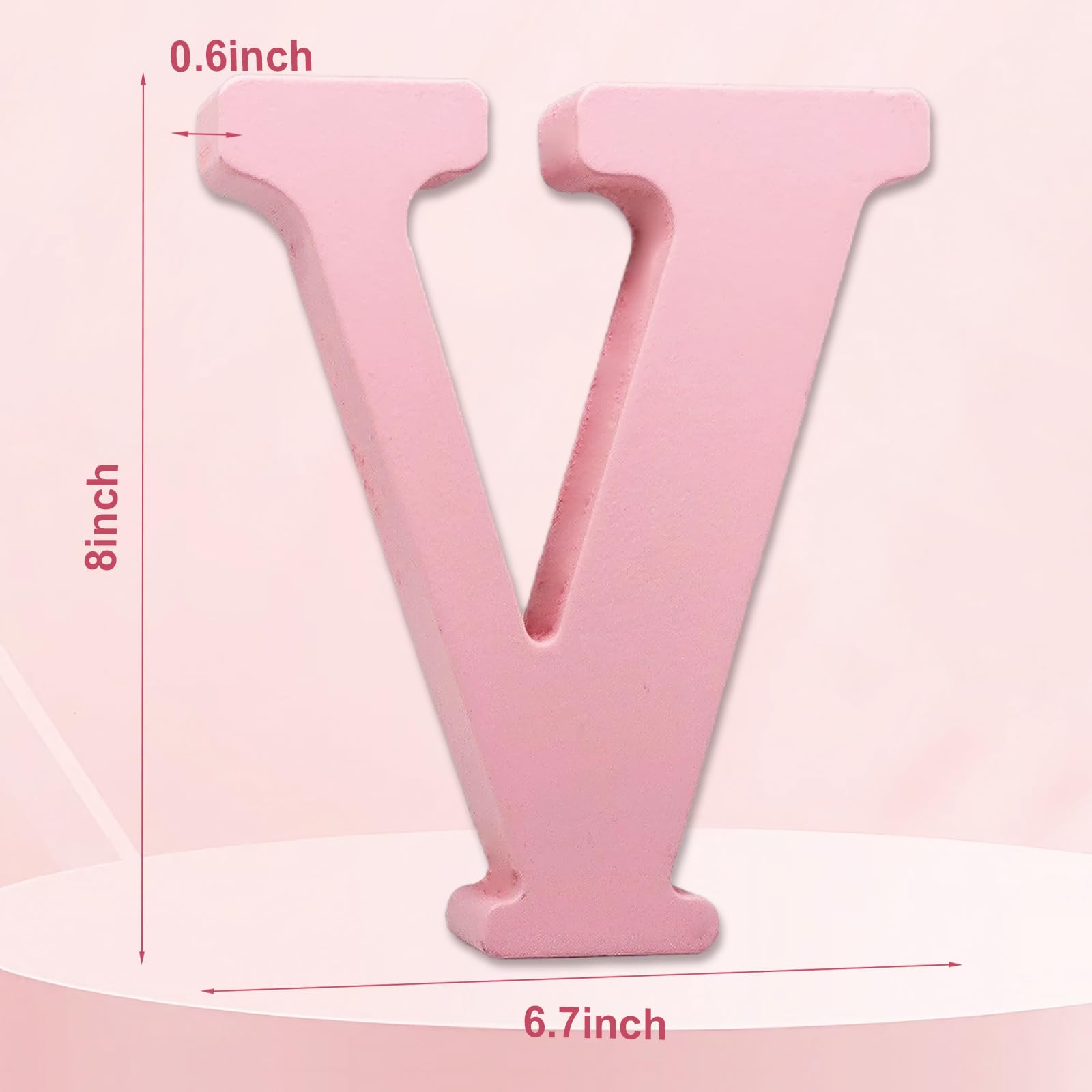 AOCEAN pink wood letter on desk ready to spell names.