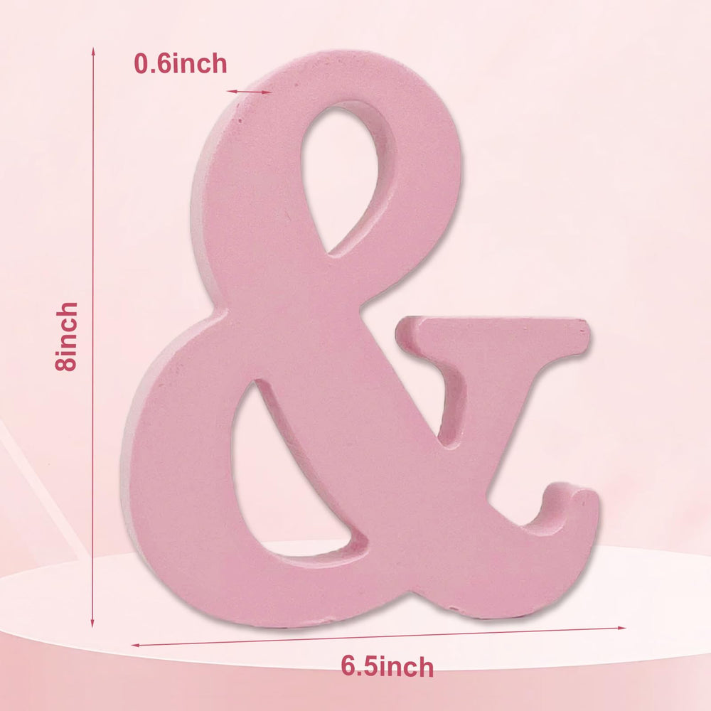 AOCEAN pink wood letter on desk adds personalized touch to kid's space.
