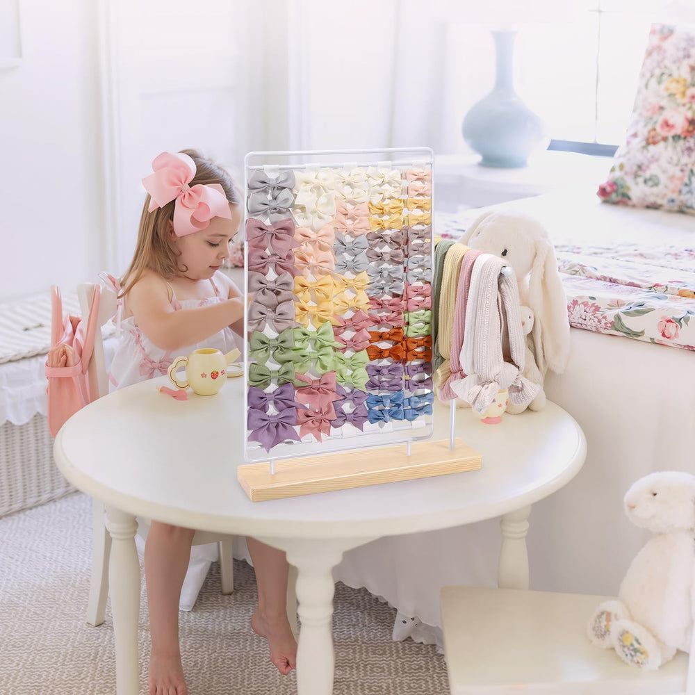 AOFLLU baby hair accessory organizer showcases bows and clips within easy reach.