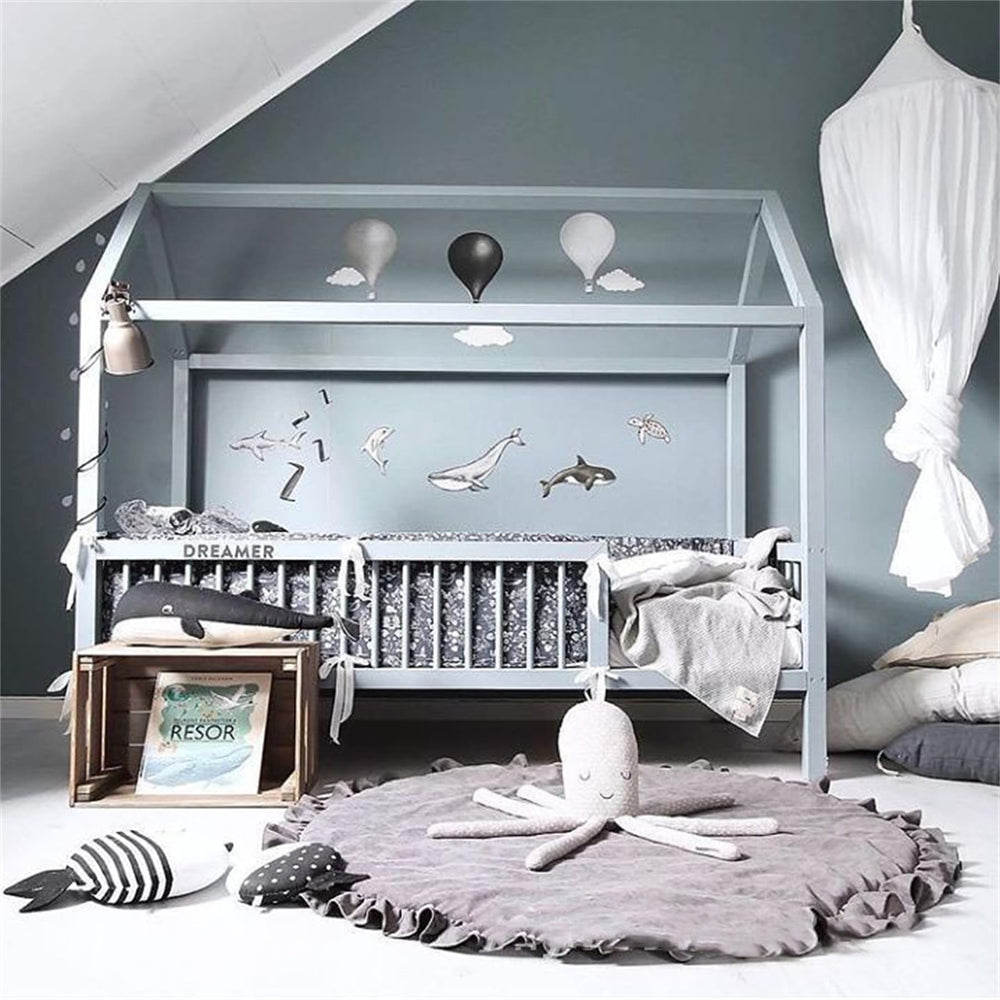 Apioiqa cotton-round-nursery-rug-ruffles-detail adds decorative charm to nurseries.