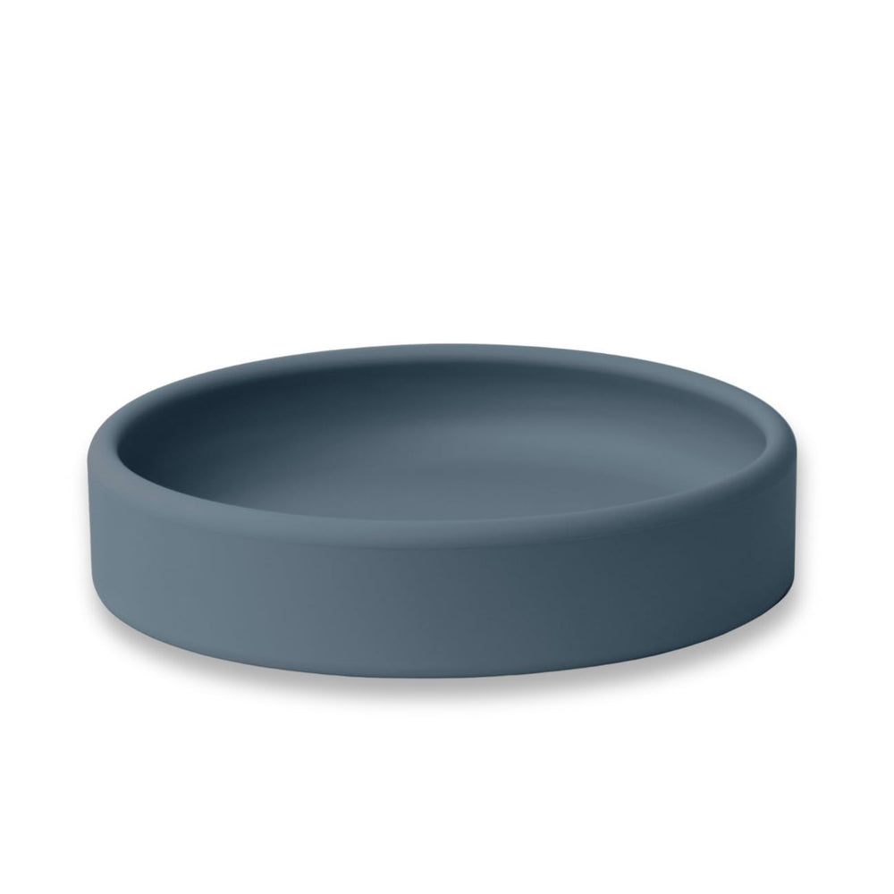 APLAINR solid plate with weighted base for spill-free meals.