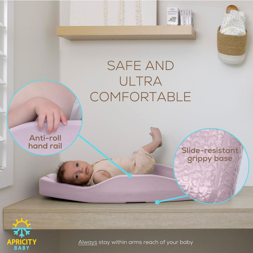 Apricity Baby contoured support area supports baby during diaper changes for comfort.