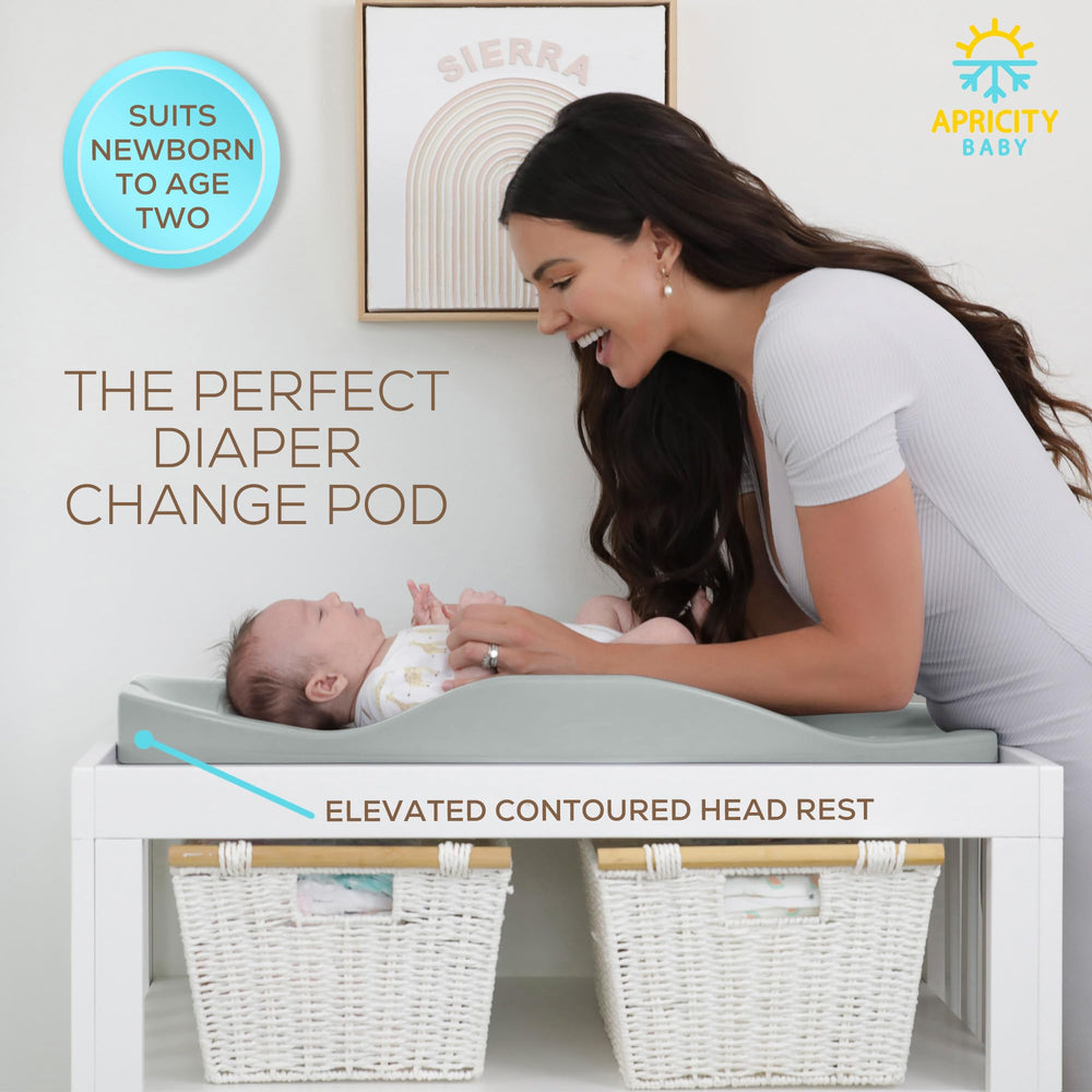 Apricity Baby Diaper Changing Pad safari growth chart tracks height during changes.