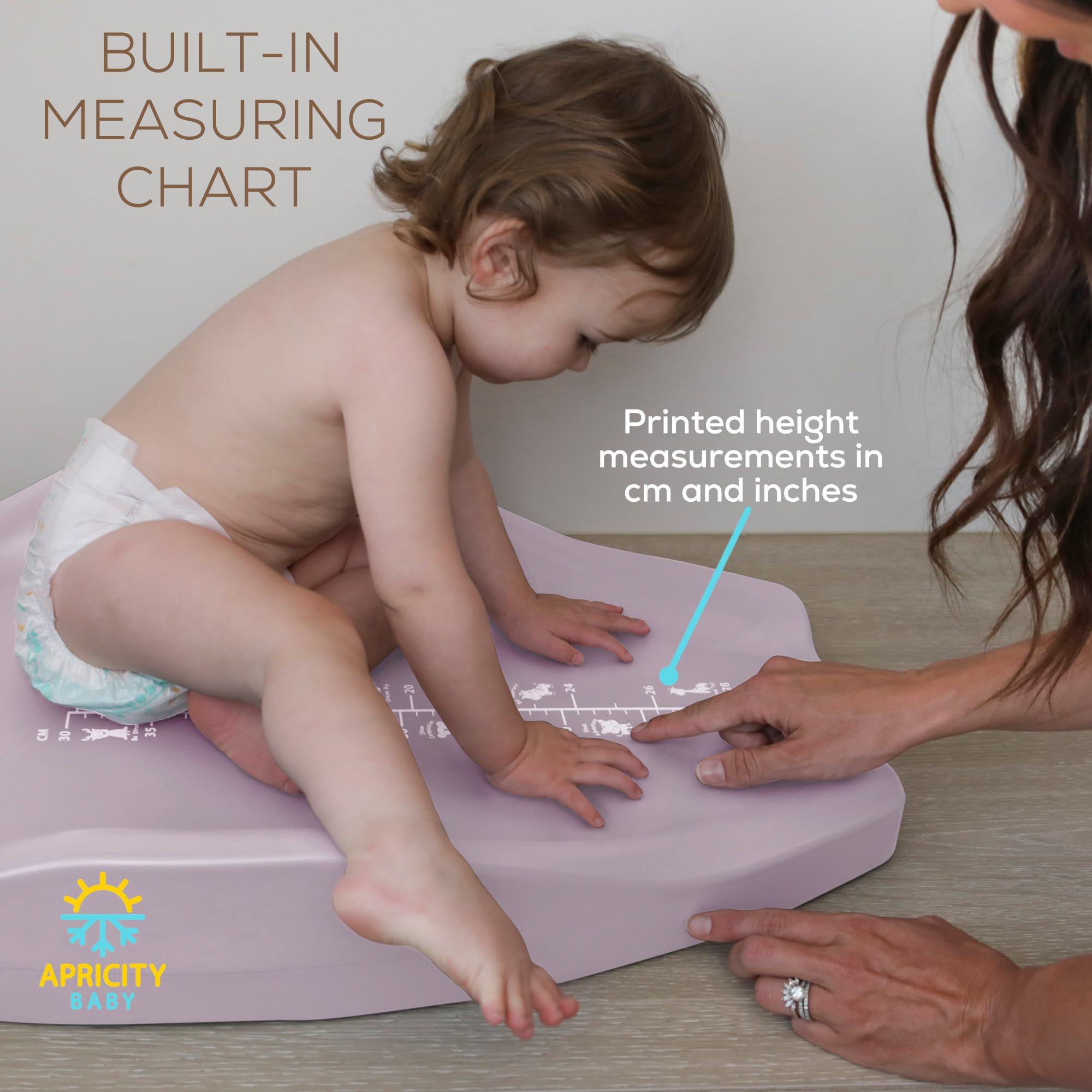 Apricity Baby safari growth chart helps track height during diaper changes.