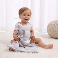 Apricot Lamb gray elephant in nursery decor adds cozy charm.