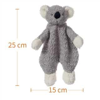 Apricot Lamb koala security blanket being cuddled by a baby