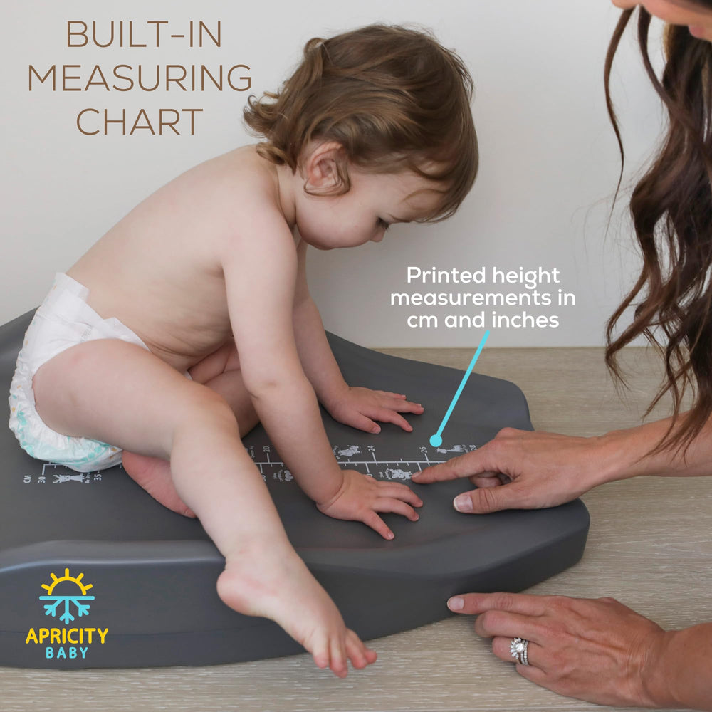 Apricity Baby diaper-changing-pad non-slip base stays put on furniture.