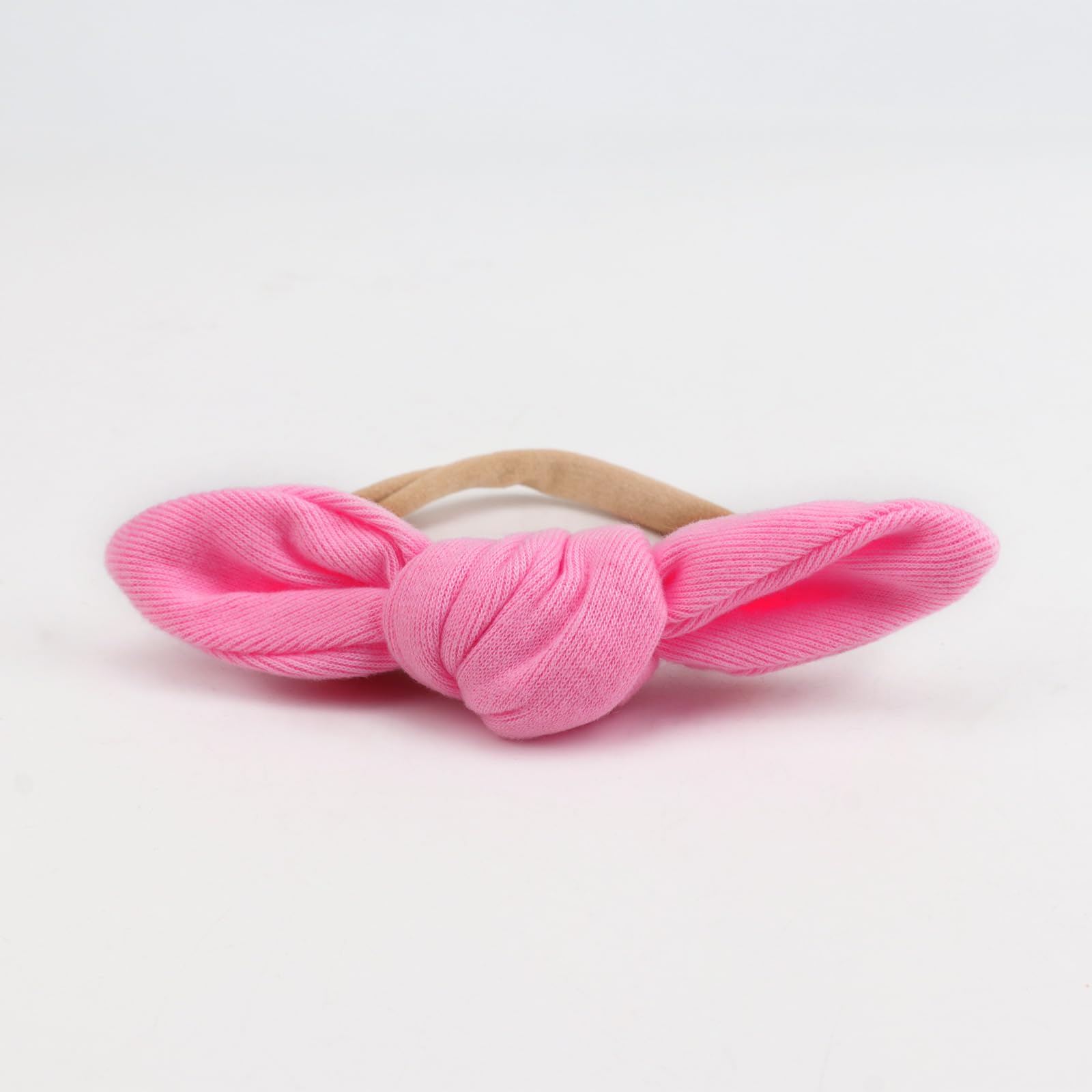 AQOKKA baby headband with bow detail – gentle comfort and adorable photo-ready style.