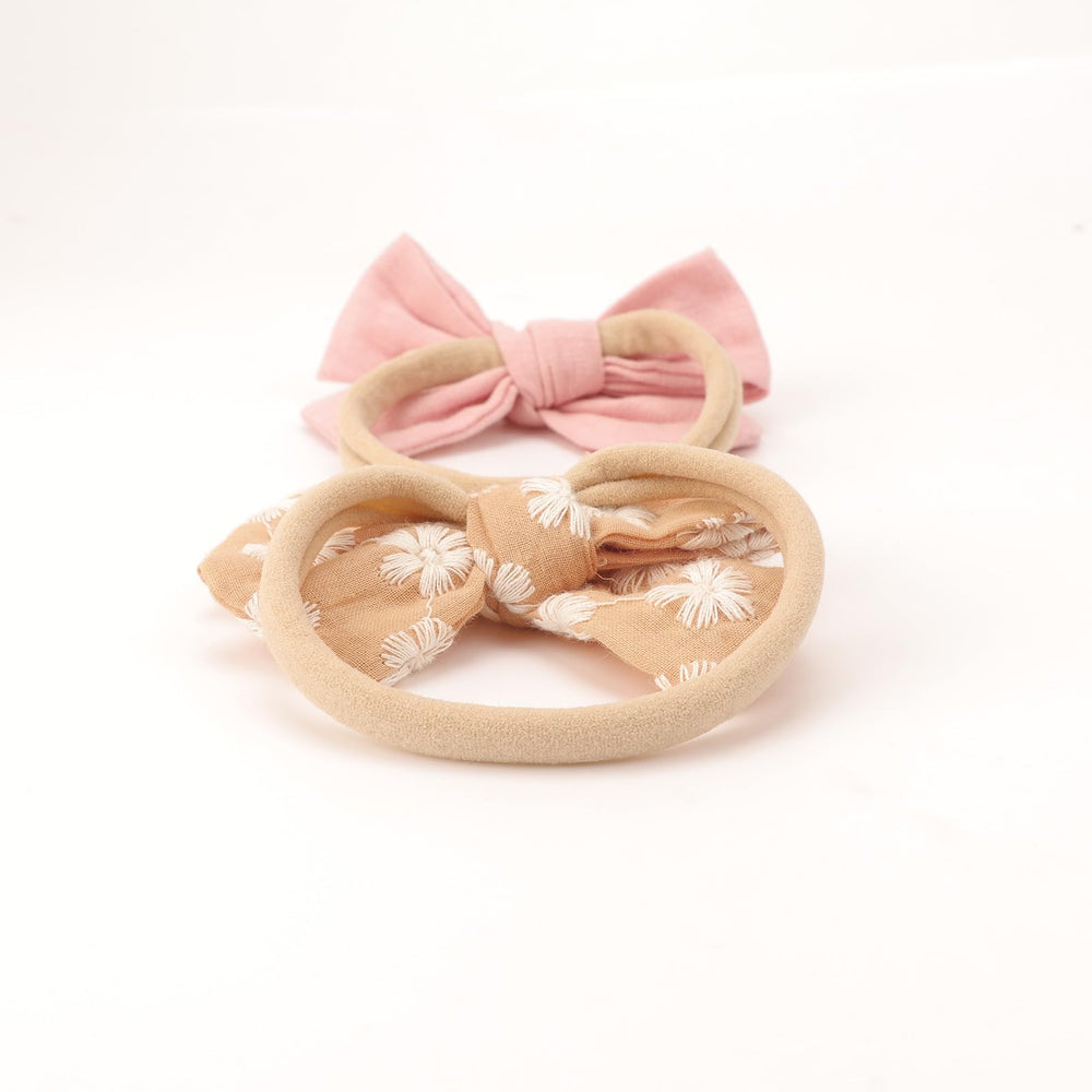 AQOKKA coral suede bow headband adds charming color without irritation.