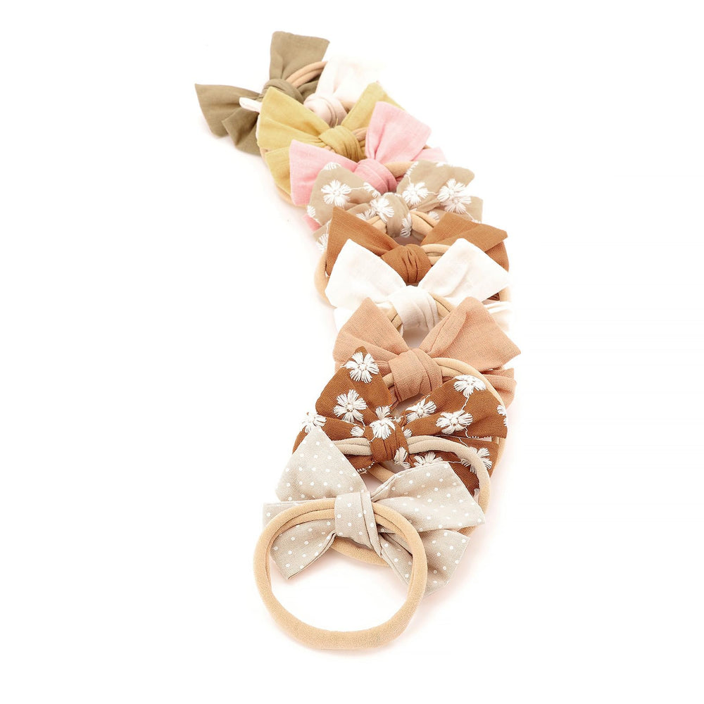 AQOKKA pink butterfly headband for adorable photos and easy outfit matching.