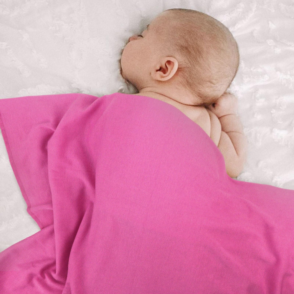AQOKKA baby photo shoot swaddle idea – versatile styling for memorable moments.