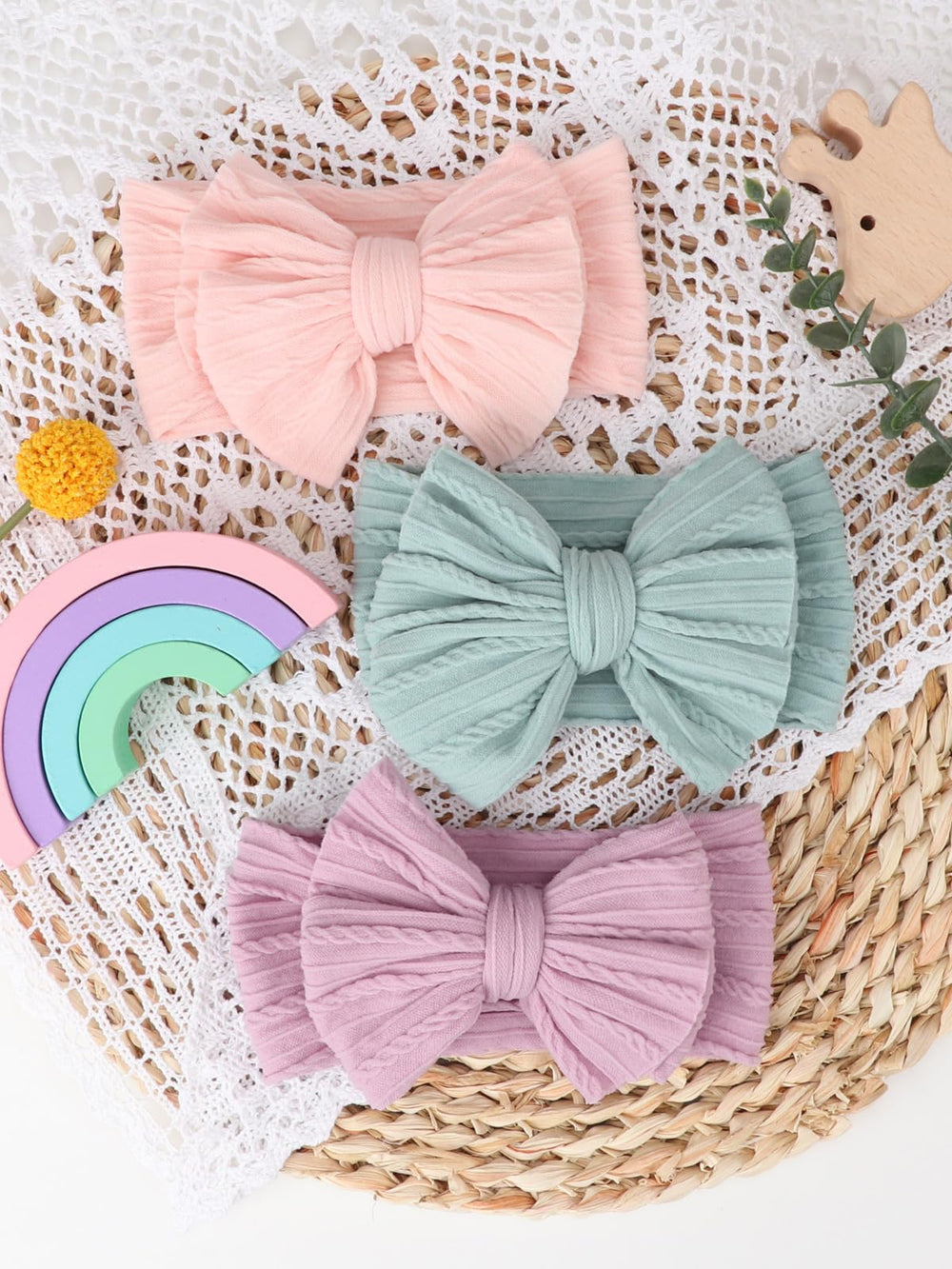 AQOKKA newborn bow headband ideal for photoshoots and family gatherings.