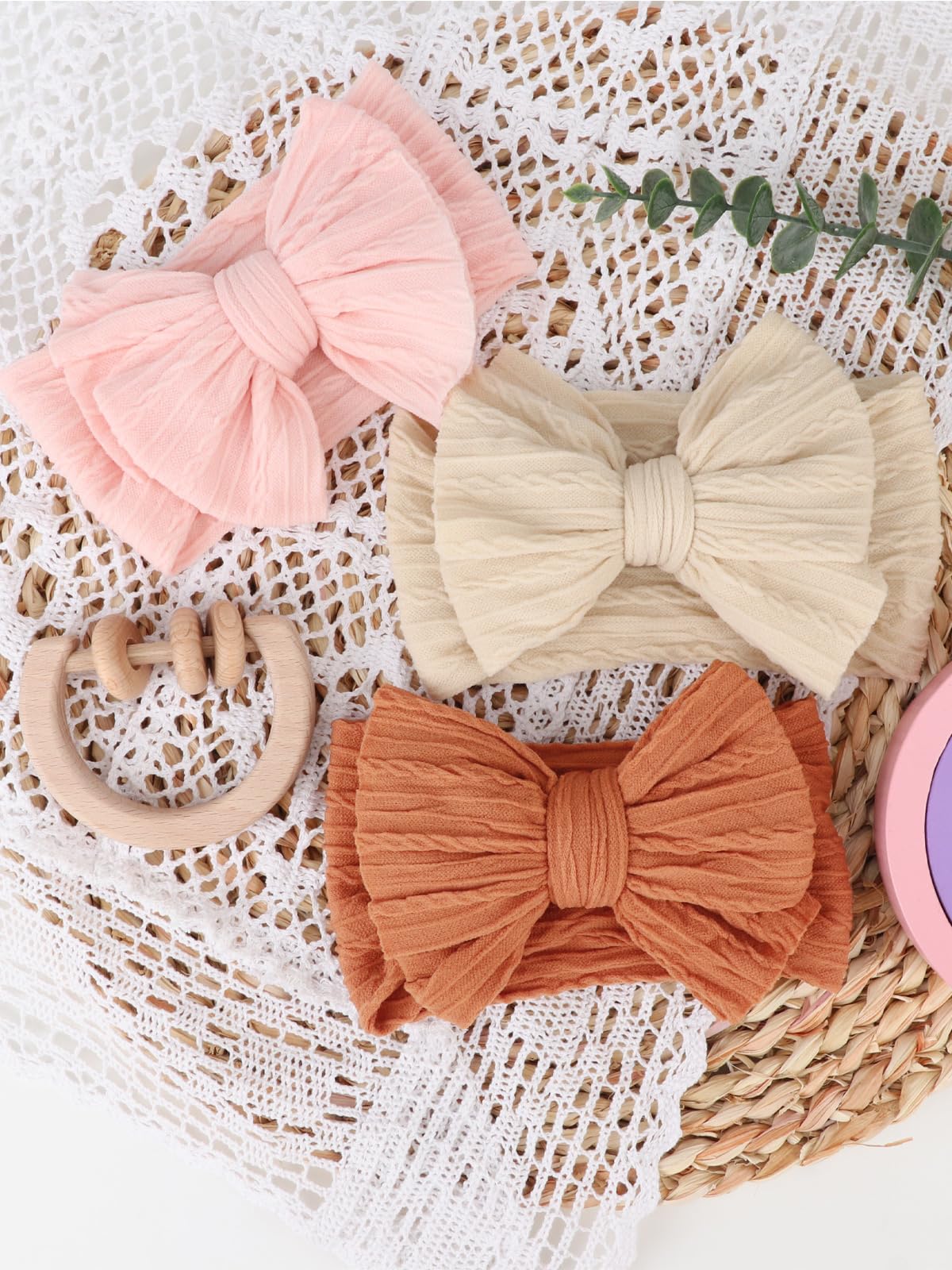 AQOKKA newborn headband is a perfect photoshoot accessory for baby portraits.