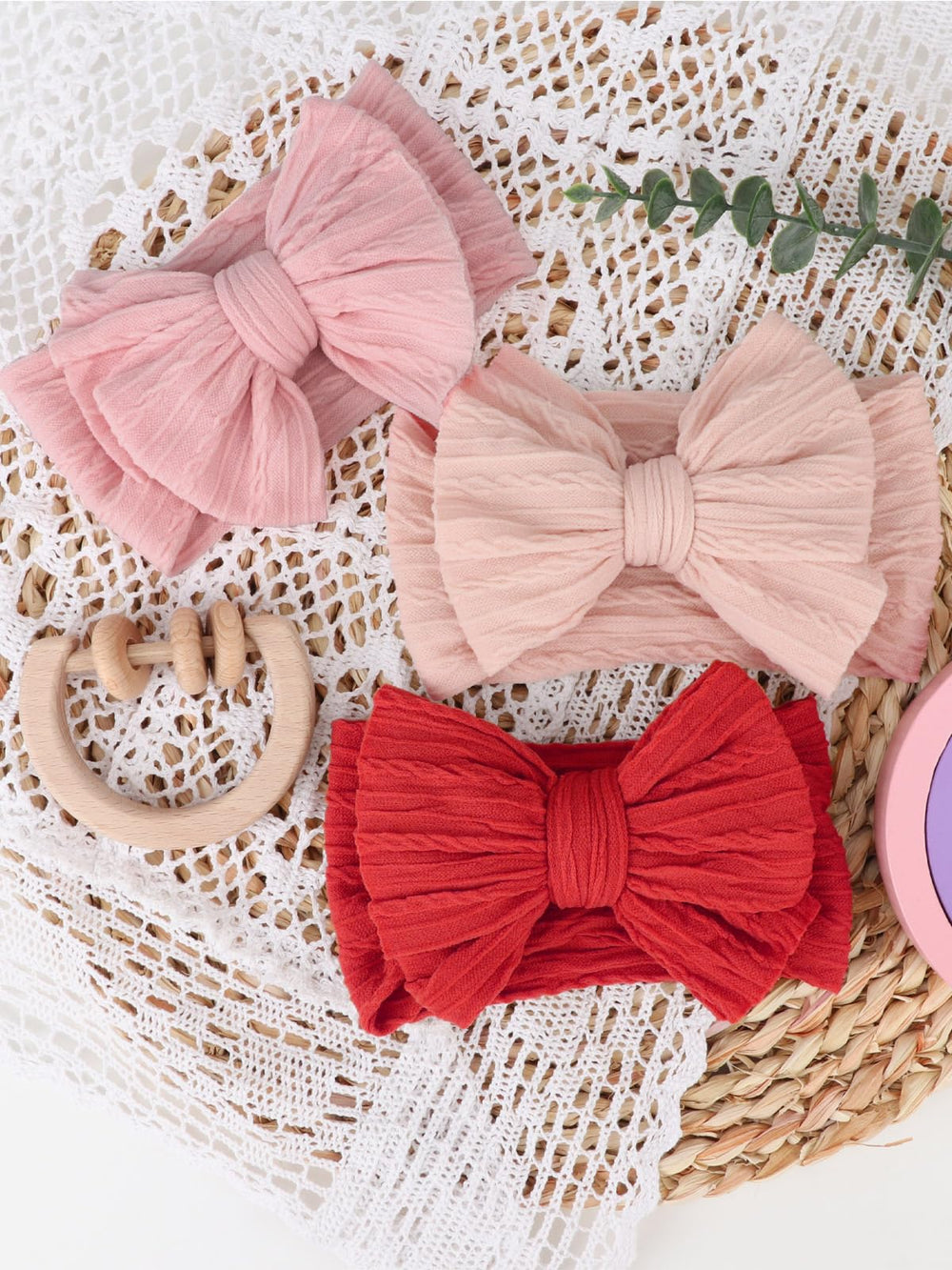 AQOKKA newborn photo prop bow headband adds charm to family pictures.